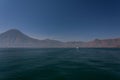 Lake Atitlan boat and volcanoes Royalty Free Stock Photo