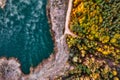 Lake and autumn coniferous forest. Drone view Royalty Free Stock Photo