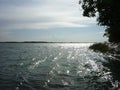 Lake on the background of a blue sky with clouds Royalty Free Stock Photo