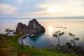 Lake Baikal, Shamanka Rock or Cape Burkhan at sunset. Royalty Free Stock Photo