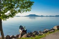 Lake Balaton with a fisher boat in the front and the Badacsonby mountain Royalty Free Stock Photo