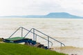 Lake Balaton with pier stairs with the Badacsony mountain in Hungary