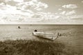 Lake bank and wooden boat Royalty Free Stock Photo