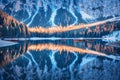 Lake with beautiful reflection in water at sunrise in autumn