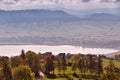 Lake behind foothills of tatra mountains. Village on lakeside Royalty Free Stock Photo