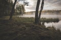 lake in a birch forest in autumn, early morning Royalty Free Stock Photo