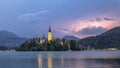 Lake bled with church under lightning storm Royalty Free Stock Photo