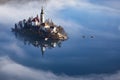 lake Bled in early morning with fog, Slovenia travel Royalty Free Stock Photo