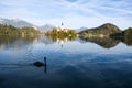 the charming natural scenery of Lake Bled with Alps at background and blue water