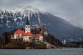 Lake Bled, Slovenia - Beautiful view of Lake Bled Blejsko Jezero with Bled Island, Bled Castle and snowy Julian Alps Royalty Free Stock Photo