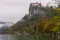 Lake Bled, Slovenia, Europe. A picture of the medieval castle and the surrounding woods in autumn Royalty Free Stock Photo