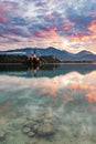 Lake Bled SLovenia and Island Church. Beautiful Sunrise and Water Reflection. Romantic Travel Destination Royalty Free Stock Photo