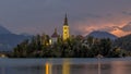 Lake bled with church under lightning in the mountains Royalty Free Stock Photo