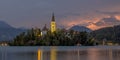 Lake bled with church under lightning in mountains Royalty Free Stock Photo