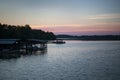 Lake and boat dock at sunrise Royalty Free Stock Photo