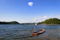 Lake boat with single cloud