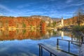 Lake Bohinj and church St. John the Baptist , Slovenia - autumn view Royalty Free Stock Photo