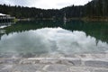 Lake Cauma, Flims, Switzerland, taking the steps into the water Royalty Free Stock Photo