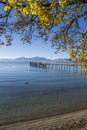 Lake Chiemsee with landing stage in autumn Royalty Free Stock Photo