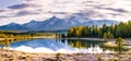 Lake Cicely Altai, Siberia, evening cloudy autumn day. Taiga, beautiful sky, haze, mountains with snow peaks, banner Royalty Free Stock Photo