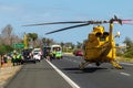 Lake Clifton, Western Australia - Mar 17, 2018: The Royal Automobile Club RAC Rescue helicopter lands on the highway to