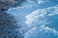 Lake close up blue water and little stones