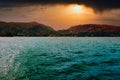 Lake Como beautiful dramatic sky sunset over mountains landscape turquoise water horizon Lombardy, Italy Royalty Free Stock Photo