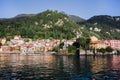 Lake Como, view of embankment and the beautiful houses of Varenna from boat. Royalty Free Stock Photo