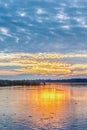 Lake covered with the first ice at sunset Royalty Free Stock Photo