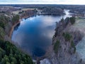 A lake covered with ice in a rural landscape Royalty Free Stock Photo