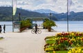 Lake cyclist and mountains in Klagenfurt, Worthersee