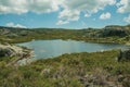 Lake from dam in a rocky terrain on highlands Royalty Free Stock Photo