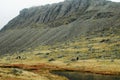 Tarn, Crags and Scree Slope on Bowfell along The Band route, Langdale, Lake District, Cumbria. England, UK Royalty Free Stock Photo