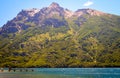 Lake with dock and mountain in the background Royalty Free Stock Photo