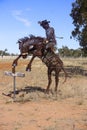 Lake Dunn trail bucking bronco rider in scrap metal.