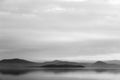 Lake at dusk, with beautiful,soft tones in the sky and water