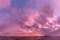 A lake at dusk, with beautiful, warm tones in the sky, clouds an Royalty Free Stock Photo