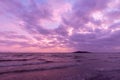 A lake at dusk, with beautiful, warm tones in the sky, clouds an Royalty Free Stock Photo