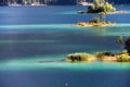 The lake Eib with turquoise hues reflecting the white clouds, Bavarian Alps, Germany Royalty Free Stock Photo