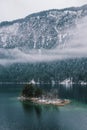 Lake Eibsee island receives a light snow-dusting