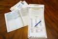 Lake Elsinore, CA, USA - May 30,2022: Close up of 2022 California Primary Election Ballot materials on wood desk.