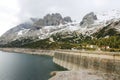 The dam of Lago di Fedaia, at the foot of the Marmolada mountain. Trento, Itlay.