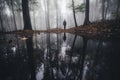 Lake in forest with man silhouette reflection Royalty Free Stock Photo