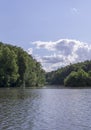 Lake in the forest at sunny summer day. nature, seasons.