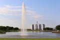 Lake with Fountain and Silos in the Background Royalty Free Stock Photo