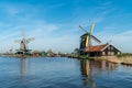 A lake in front of windmills in Netherlands Royalty Free Stock Photo