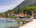 Lake Garda (Lago di Garda), coast and mountains with the small village of Limone sul Garda Royalty Free Stock Photo