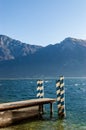 Small wooden jetty - Lake Garda and Baldo mountain Italy Royalty Free Stock Photo