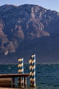 Small wooden jetty - Lake Garda and Baldo mountain Italy Royalty Free Stock Photo