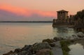 Lake Garda sunset with the tower of The Scaliger Castle Royalty Free Stock Photo